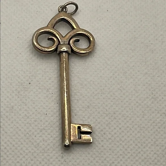 Tiffany & Co Fleur De Lis Key Pendant Charm 925 Sterling Silver